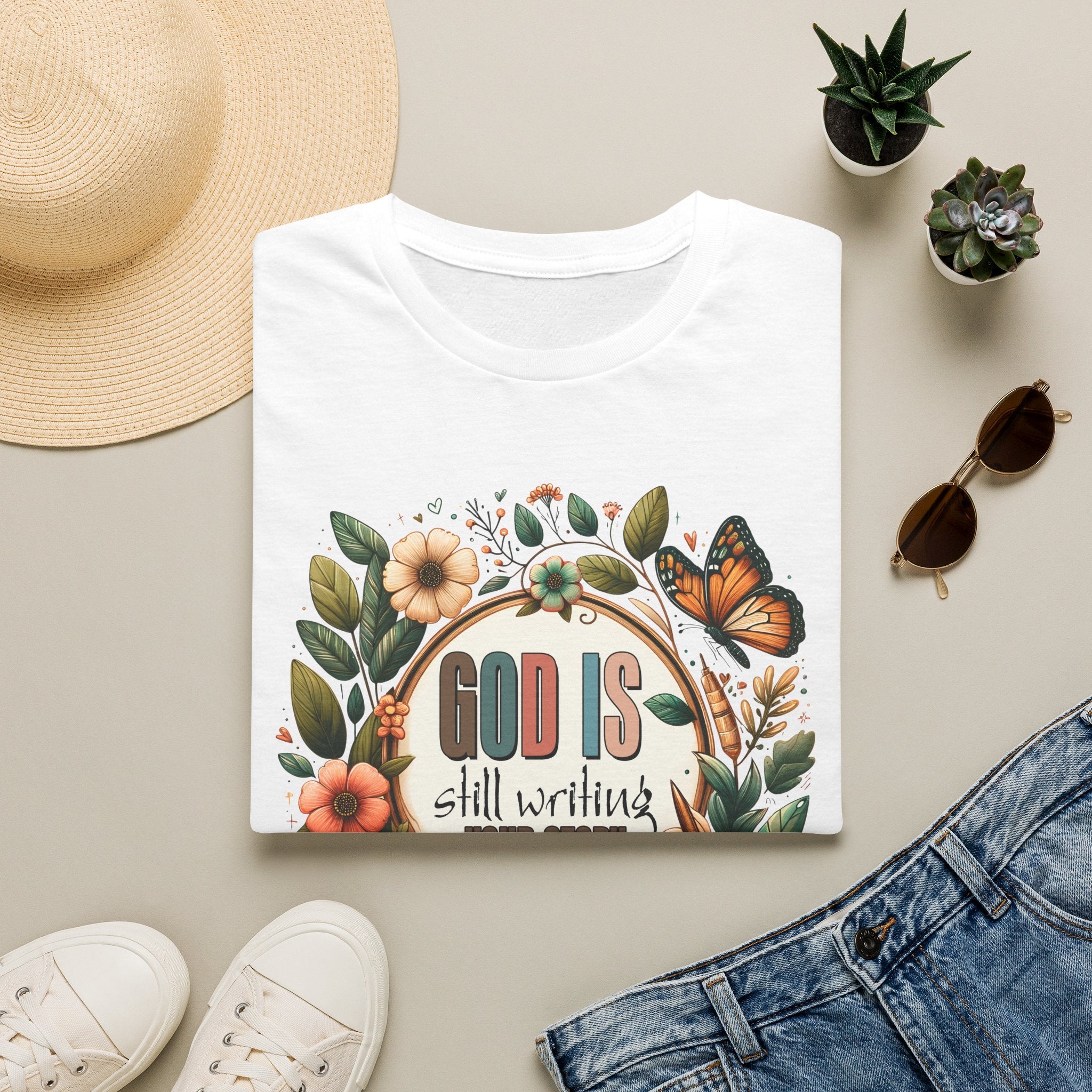Inspirational T-Shirt — "God Is Still Writing Your Story" Floral Faith Tee