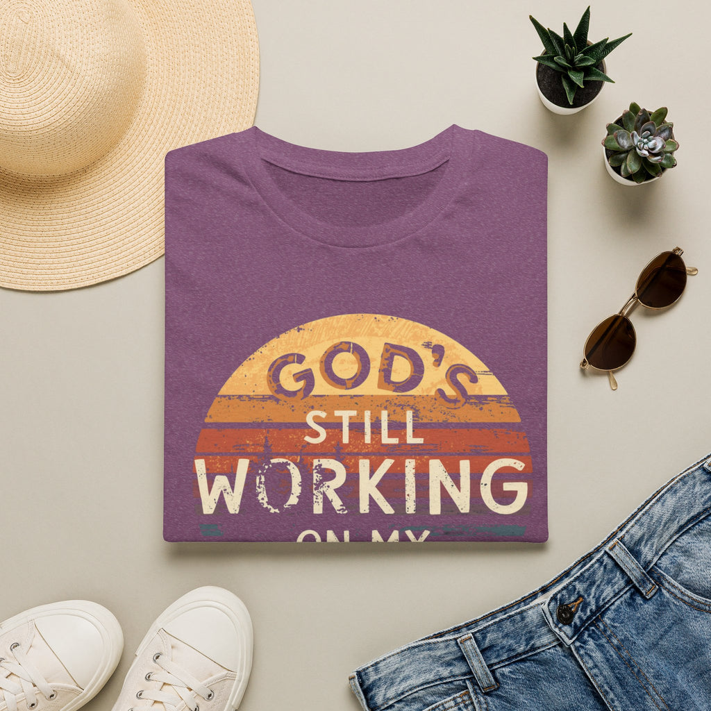 Christian T-Shirt — "God’s Still Working on My Attitude" Retro Sun Graphic