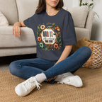 Inspirational T-Shirt — "God Is Still Writing Your Story" Floral Faith Tee