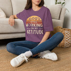 Christian T-Shirt — "God’s Still Working on My Attitude" Retro Sun Graphic