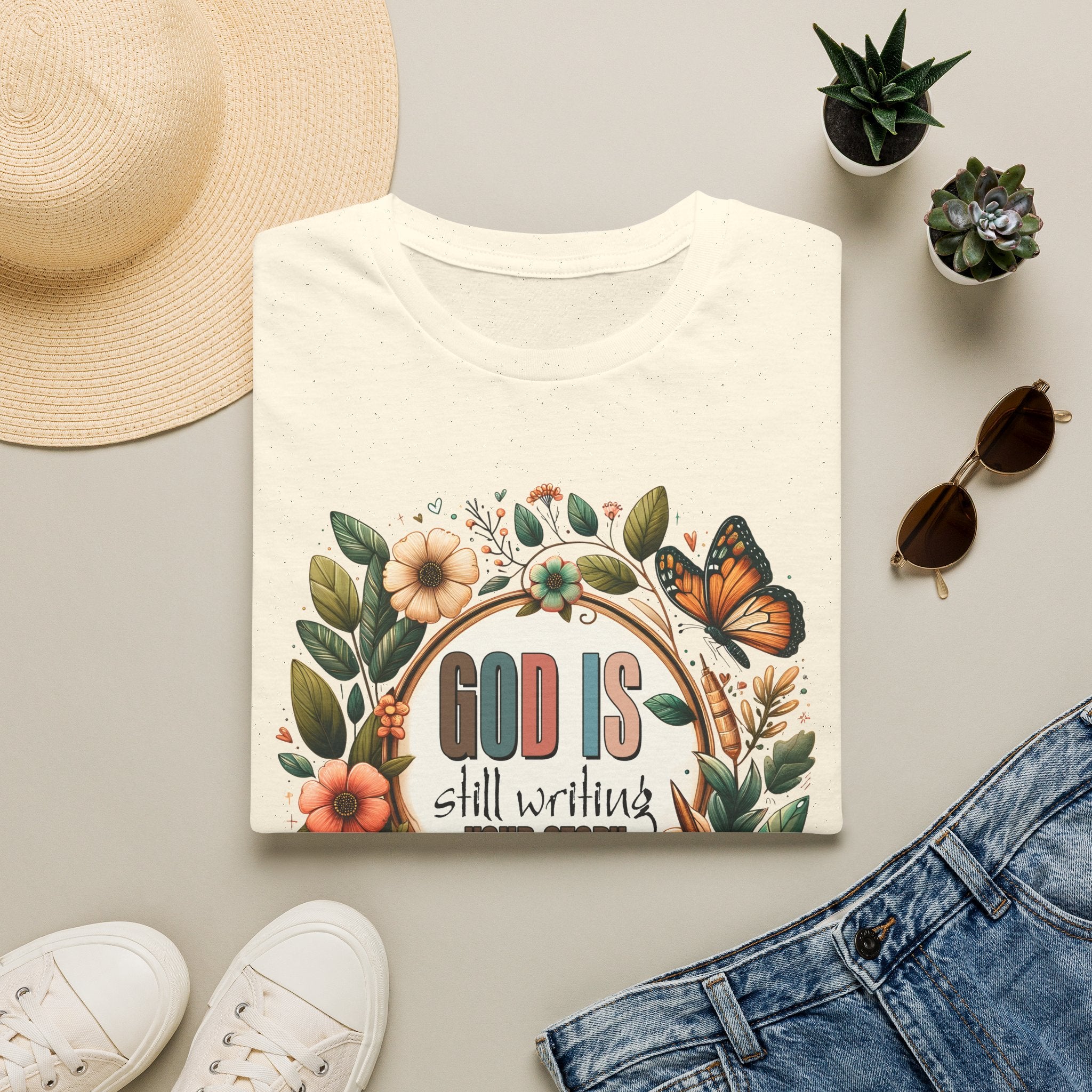Inspirational T-Shirt — "God Is Still Writing Your Story" Floral Faith Tee